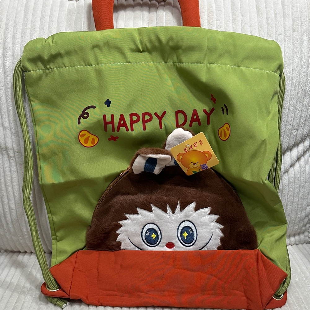 Green and Orange Backpack w/ handle& a Cute Labubu Design.New. Not used.